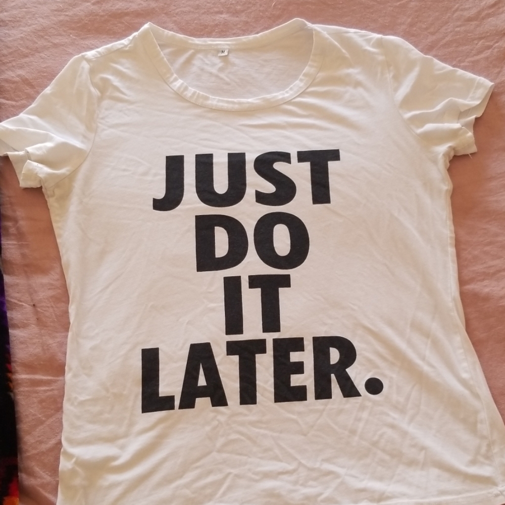 Nike white T-shirt, just do it later